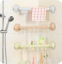 Simple 6 hooks hanger which sticks by suction