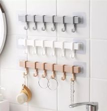 Punch free 6 hook wall hanger available in gray ,white and peach