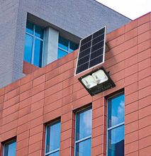 TNTORCH 100w Solar Security Floodlight With A Solar Panel