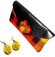 Womens Maasai clutch with yellow earrings