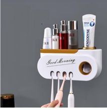 Classy Good morning Toothpaste dispenser and toothbrush holder